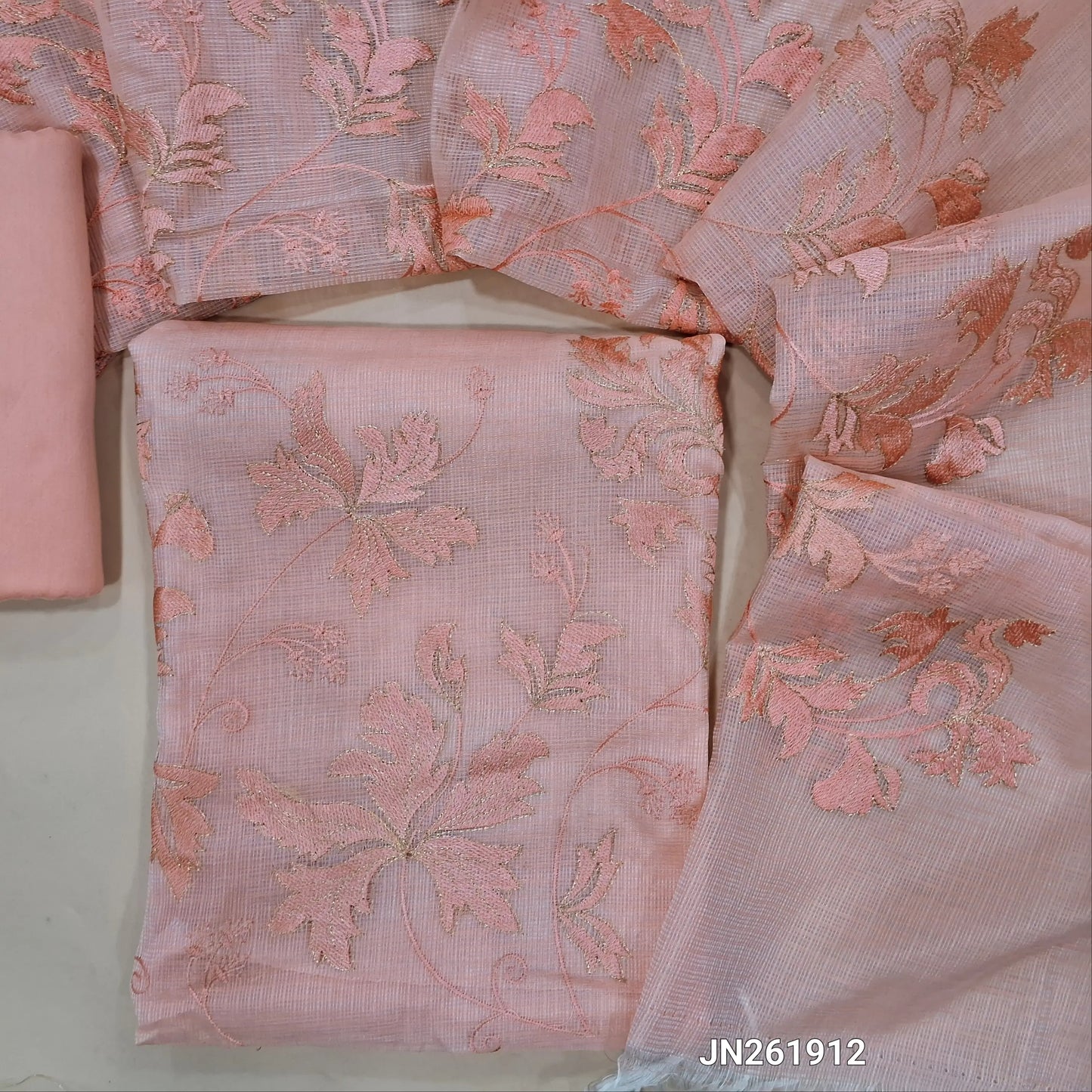 Designer pastel pink premium kota unstitched salwar material,self embroidery &zari detailing on daman, embroidery work front(Lining Needed) matching bottom,rich embroidery & zari work on kota dupatta with banarasi woven borders. JN261912