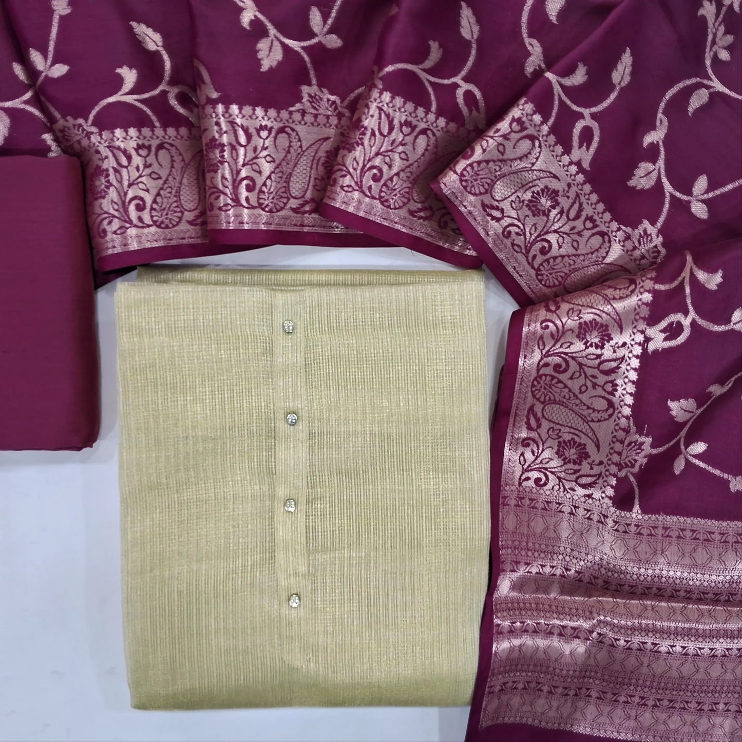 Golden beige tissue silk cotton unstitched salwar material, (shiny fabric, lining needed)purple silk cotton bottom, banarasi zari woven tissue silk cotton dupatta with tassels. JN262109
