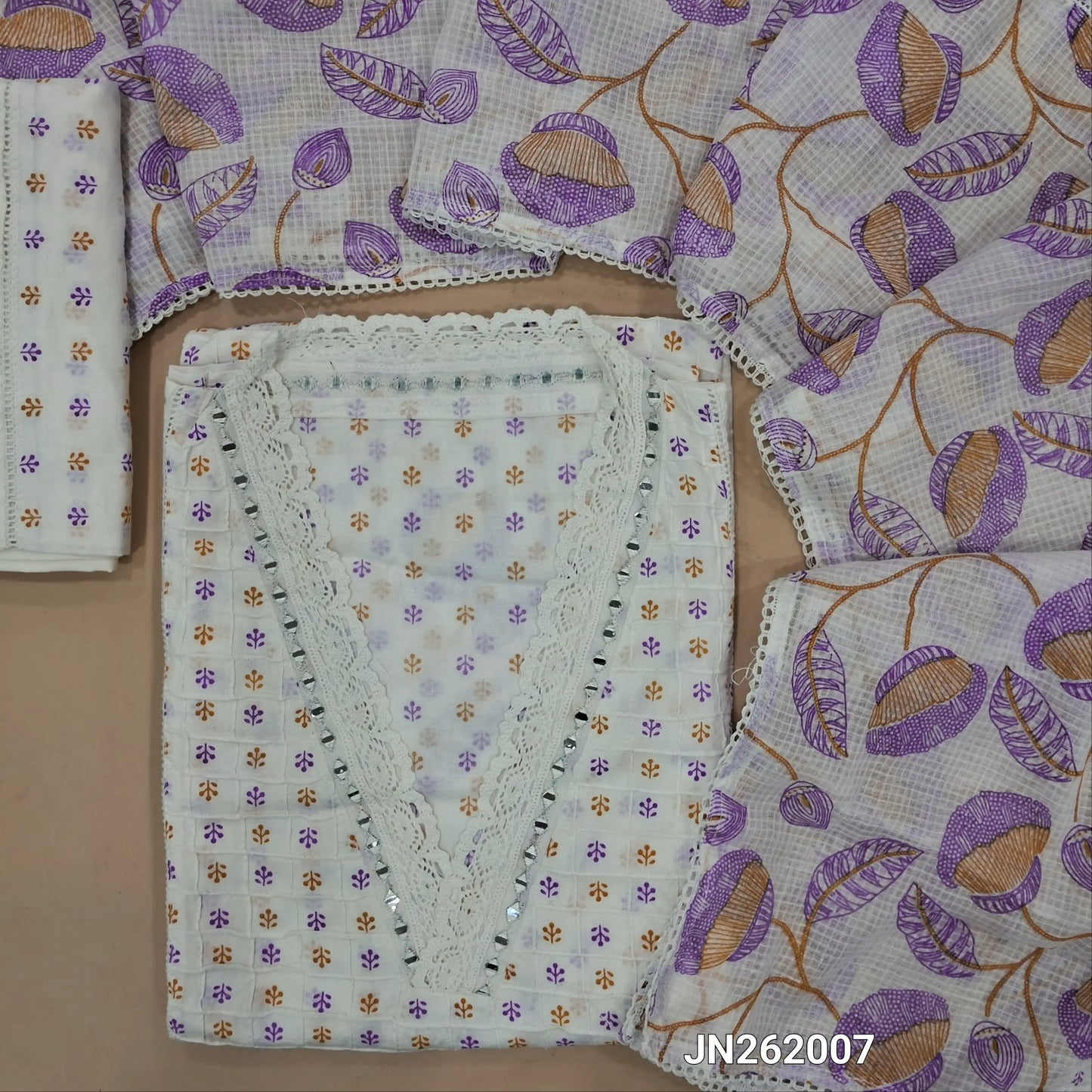 White cotton unstitched salwar material,collar neck with real mirror,(purple)pintex work on front,panel design,(lining needed)schiffli cotton bottom,pure kota cotton dupatta. JN262007