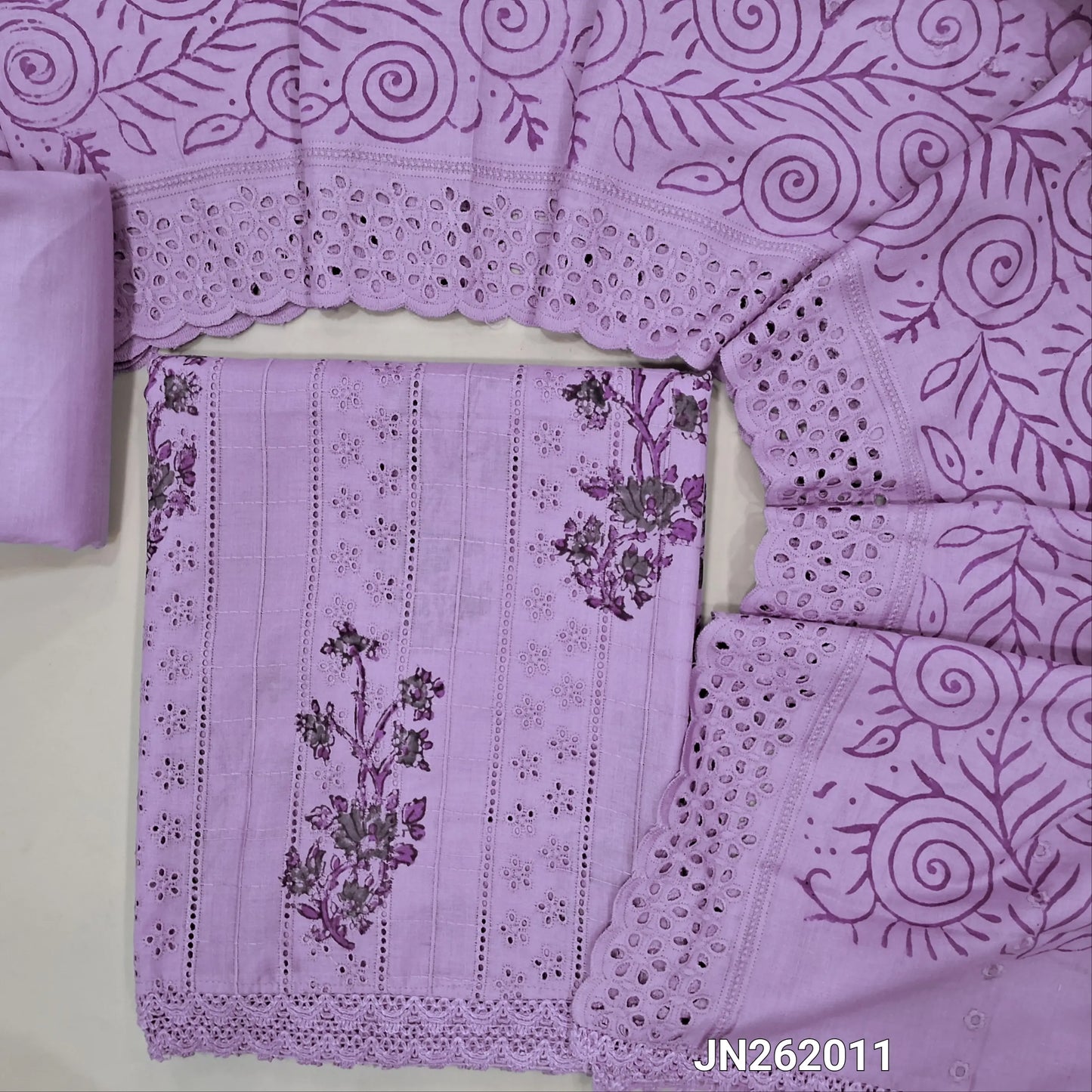 Mauve shade block printed soft glazed cotton unstitched salwar material(lining needed) schiffli embroidered,cut work & self embroidery work on front, cotton bottom,block printed & schiffli embroidered mul cotton dupatta with scallop borders. JN262011