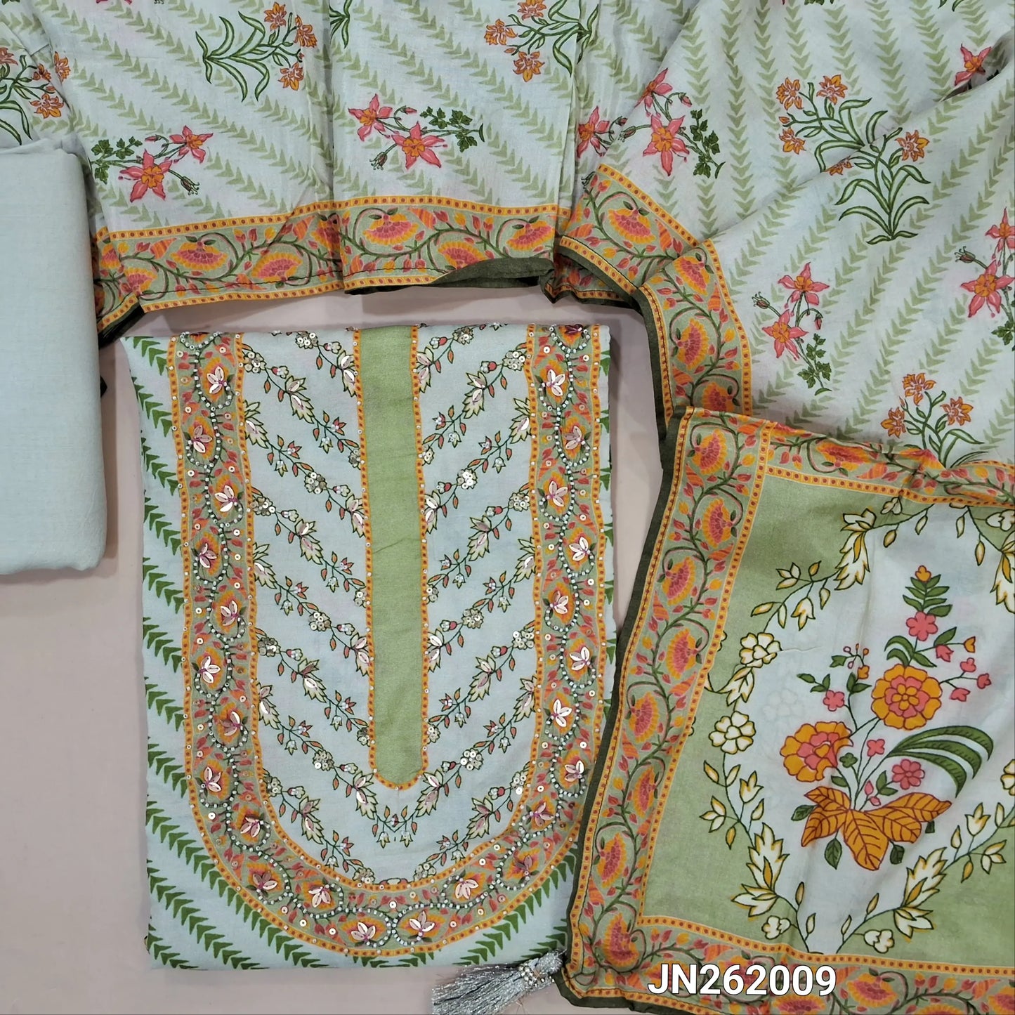 Designer pastel green pure muslin silk unstitched salwar material,sugar bead & sequins work on yoke,panel design,floral printed all over(lining needed)santoon bottom, digital printed short width pure muslin silk dupatta. JN262009