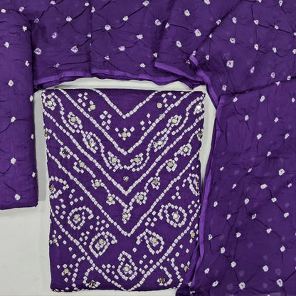 Purple bandhini unstitched salwar material,dye and dyed &bead, real mirror work on yoke,(lining needed)dye and dyed bottom, bandhini pure cotton dupatta. JN262105