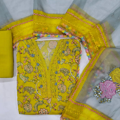 Mehandhi yellow soft silk cotton unstitched salwar material (lining needed)v neck on yoke with lace detailing,penal design, spun cotton bottom, floral embroidery fancy organza dupatta with lace tapping.JN262102