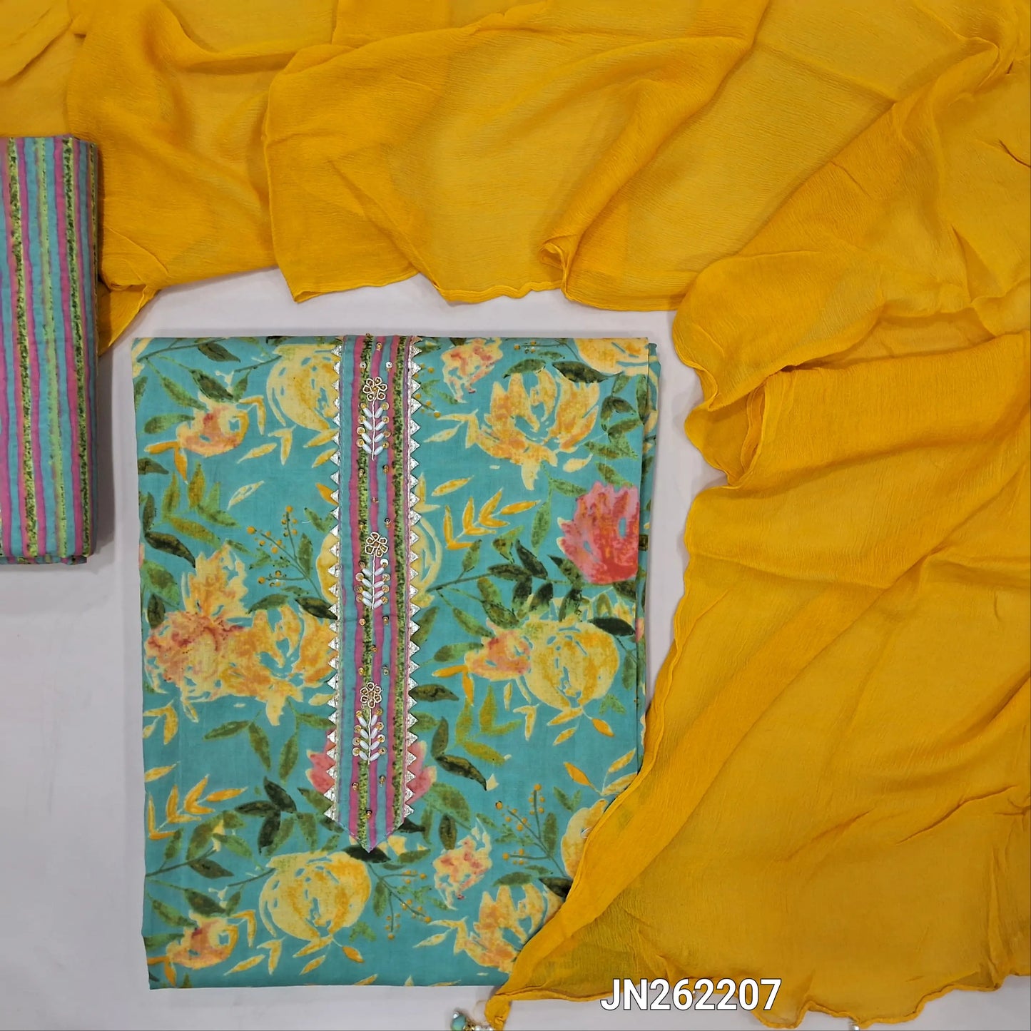 Sage green premium floral printed pure cotton unstitched salwar material,zardosi & peal bead work on yoke( soft,lining optional)printed cotton bottom,pure chiffon dupatta with bead tassels.JN262207