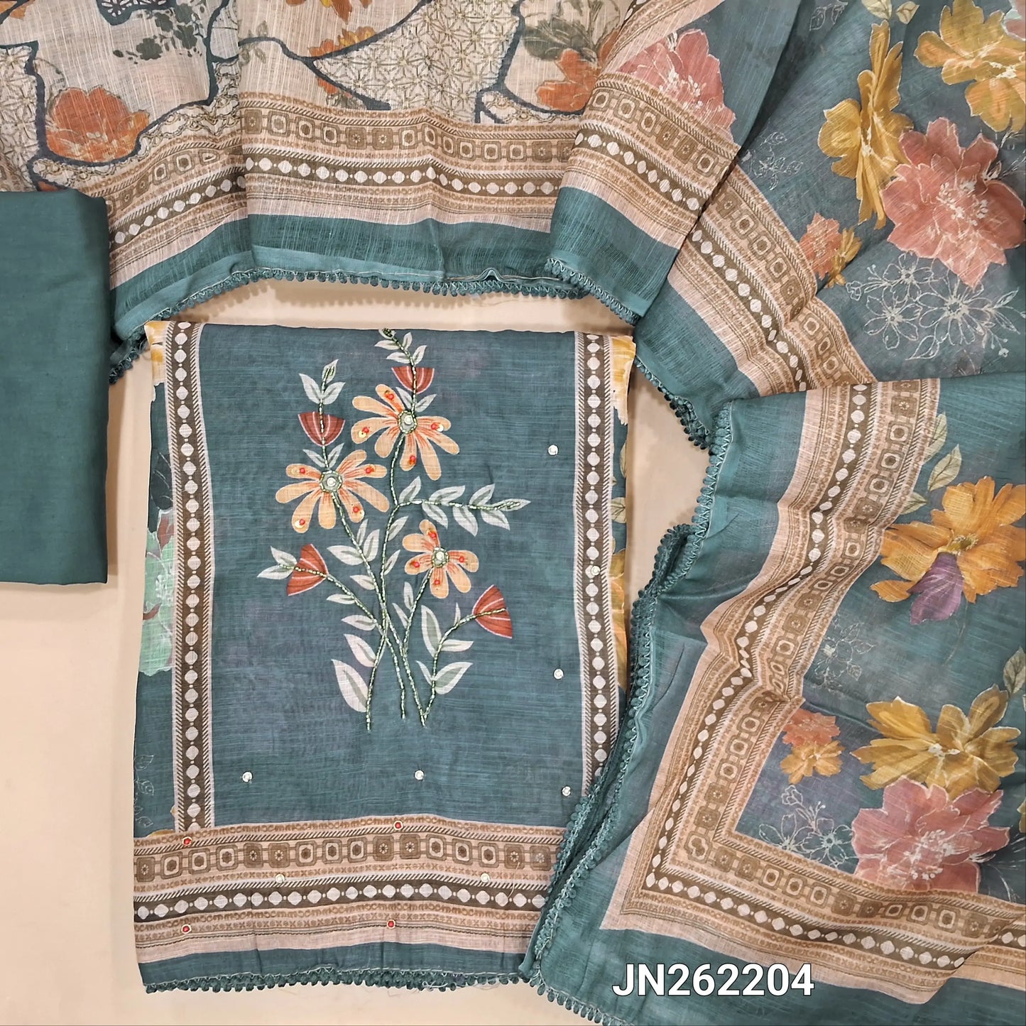Teal blue floral printed semi linen unstitched salwar material(lining needed)penal design,cut bead & zardosi work,matching cotton bottom,floral printed semi linen full length dupatta. JN262204
