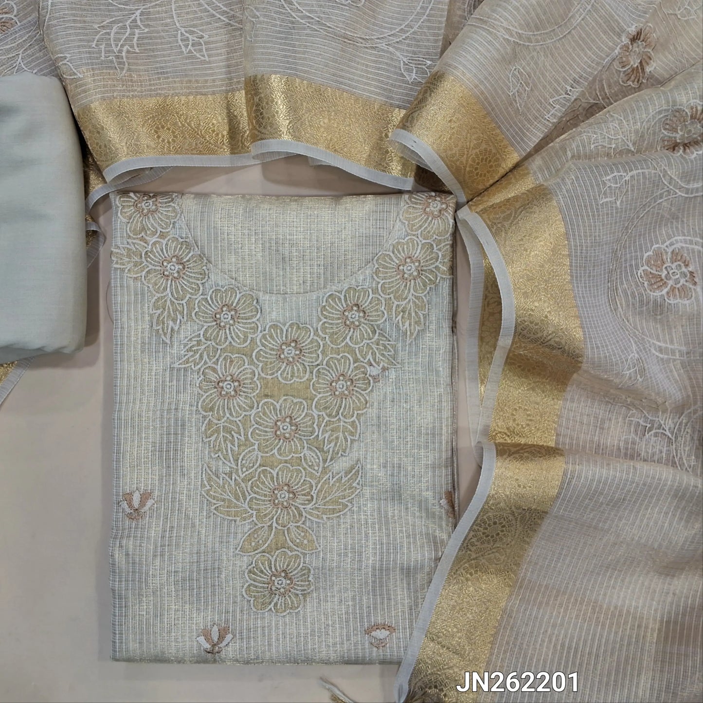 Rich golden beige premium tissue kota unstitched salwar material (lining needed) rich embroidery work on yoke,embroidery & applique work on daman,spun cotton bottom, rich embroidery work on tissue kota dupatta with benarasi zari woven borders. JN262201