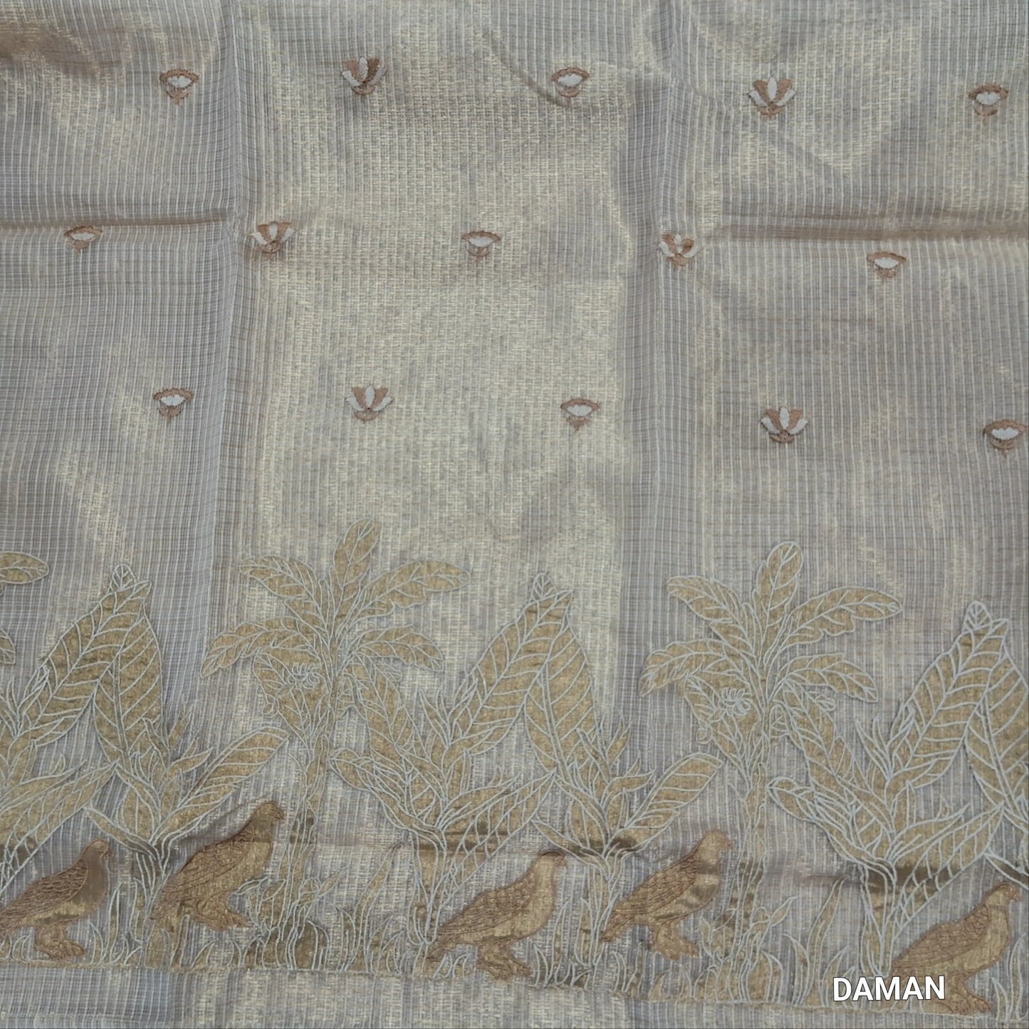 Rich golden beige premium tissue kota unstitched salwar material (lining needed) rich embroidery work on yoke,embroidery & applique work on daman,spun cotton bottom, rich embroidery work on tissue kota dupatta with benarasi zari woven borders. JN262201