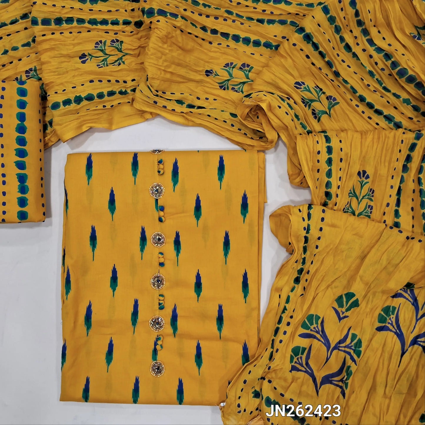 Designer mehandhi yellow printed premium mul cotton unstitched salwar material, buttons cut bead & sugar bead work on yoke(soft,lining optional)block printed cotton bottom,printed pure mul cotton full length duppata with handmade tassels.JN262423