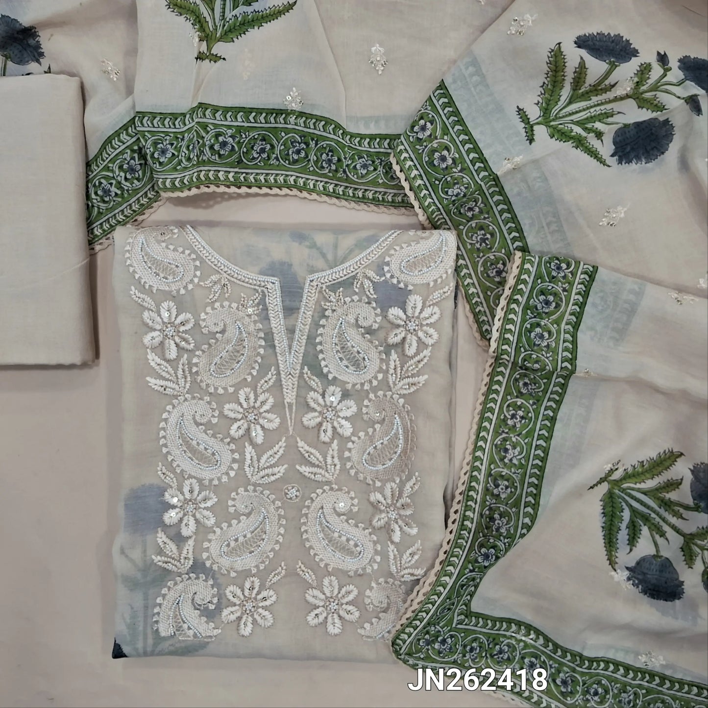 Designer beige mul chanderi unstitched salwar material, embroidery, sugar bead and sequins on yoke,Mughal printed all over,(lining needed)santoon bottom,embroidery and sequins work mul chanderi dupatta with printed borders and lace detailing. JN262418