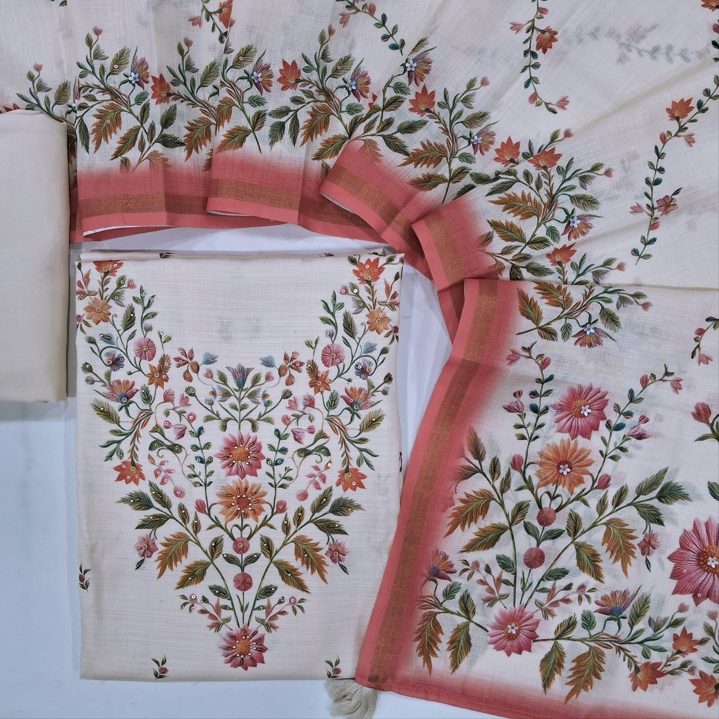Off white base accord linen unstitched salwar material,digital prints,bead &sequins work on yoke, floral prints front( textured,lining needed ) spun cotton bottom,floral printed& sequins accord linen dupatta with gold tissue borders. JN262905