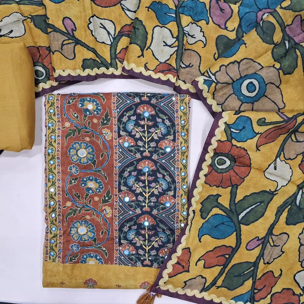 Designer mehandhi yellow pure muslin silk unstitched salwar material(silky,lining needed)embroidery, sequins & faux mirror work on yoke, kalamkari printed all over, spun cotton bottom,kalamkari printed short width pure muslin silk dupatta. JN262802