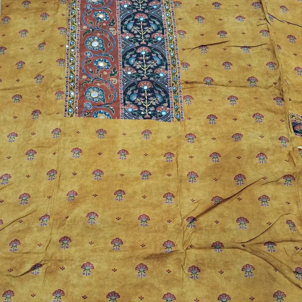 Designer mehandhi yellow pure muslin silk unstitched salwar material(silky,lining needed)embroidery, sequins & faux mirror work on yoke, kalamkari printed all over, spun cotton bottom,kalamkari printed short width pure muslin silk dupatta. JN262802