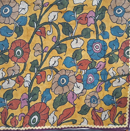 Designer mehandhi yellow pure muslin silk unstitched salwar material(silky,lining needed)embroidery, sequins & faux mirror work on yoke, kalamkari printed all over, spun cotton bottom,kalamkari printed short width pure muslin silk dupatta. JN262802