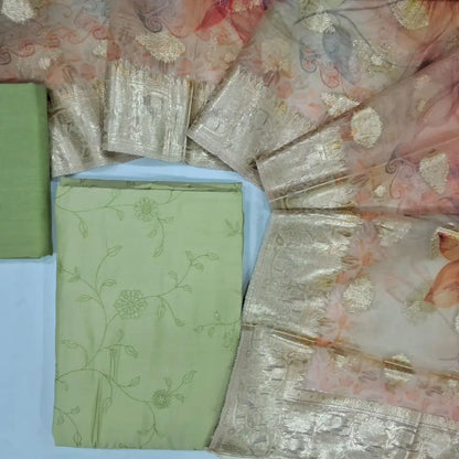 Pastel green silk cotton unstitched salwar material (lining needed) self embroidery allover,silky bottom, digital printed fancy organza dupatta with zari buttas & borders.JN262818
