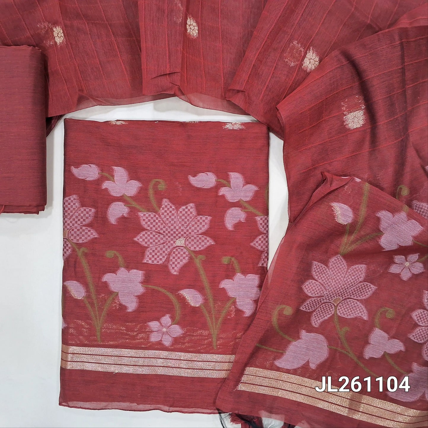 Reddish marron jamdani woven silk cotton unstitched salwar material,thread and zari buttas on front,weaving daman, (lining needed) silk cotton bottom,jamdani woven and self checked weaving on full length silk cotton dupatta with pallu. JL261104