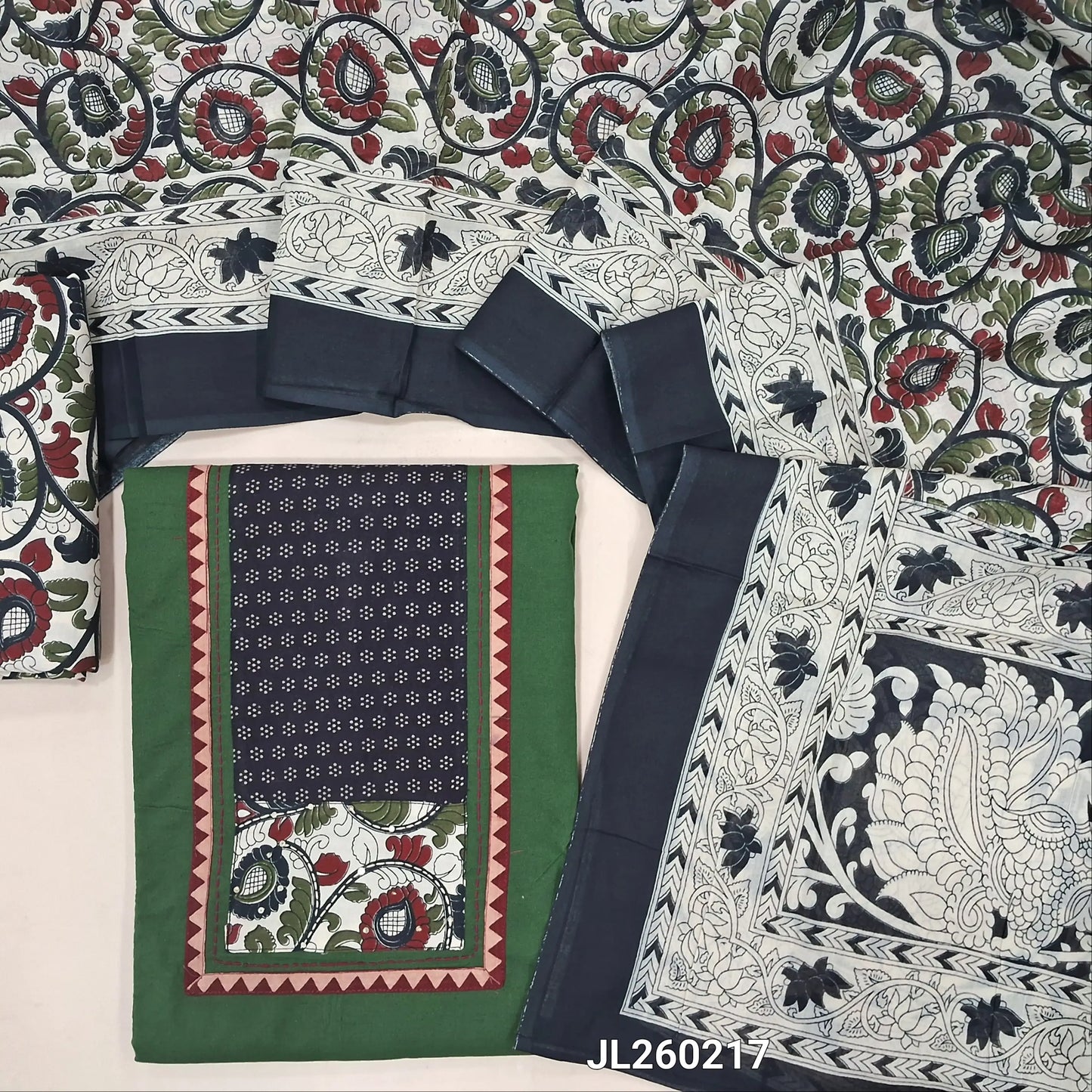 Green premium dabu cotton unstitched salwar material,ajrak yoke patch and kalamkari work,hand embroidery & mirror work on front(soft,lining optional)kalamkari cotton bottom, kalamkari printed mul cotton dupatta. JL260217