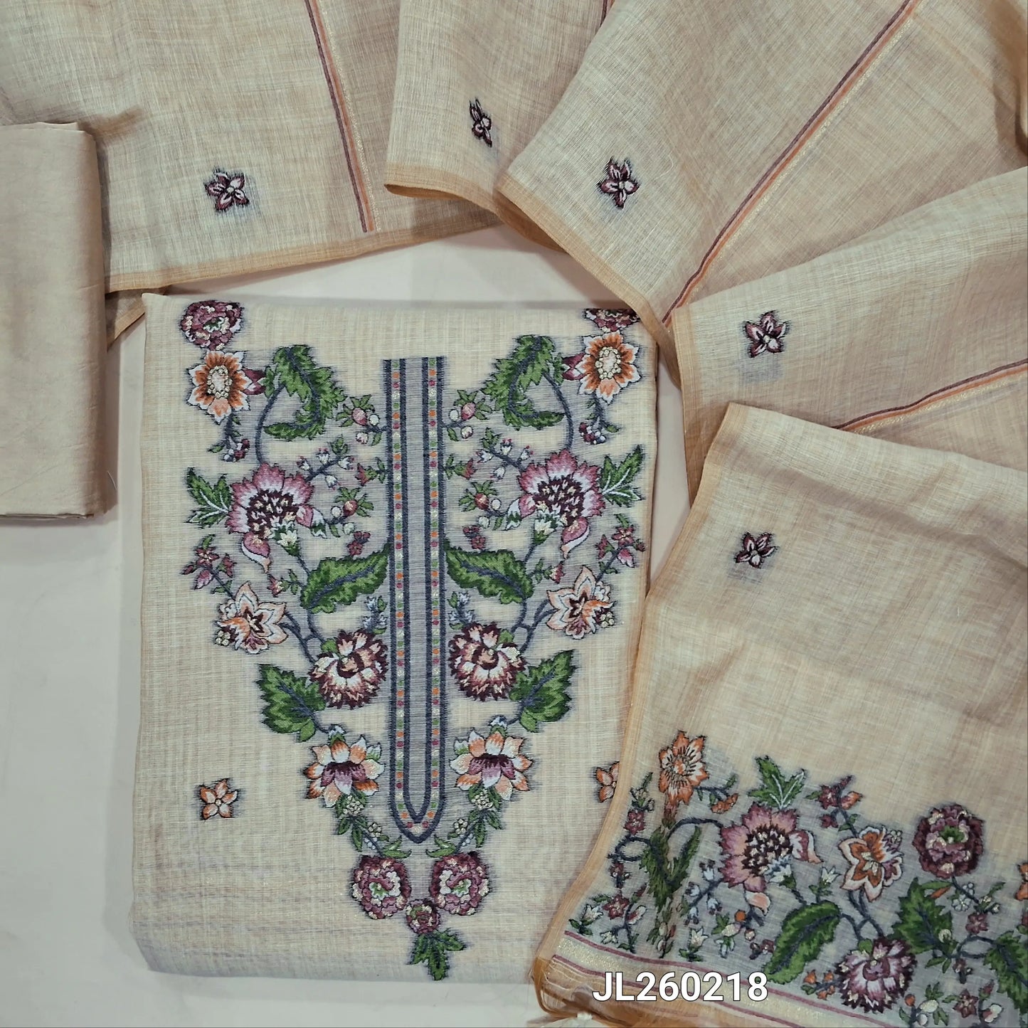 Designer rich beige silk cotton unstitched salwar material,(lining needed)weaving work on yoke and daman,floral buttas on front,matching silky bottom, jamdani woven full length silk cotton dupatta with handmade tassels.JL260218