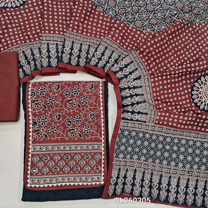 Black schiffli embroidered pure cotton unstitched salwar material(lining needed) real mirror work on yoke, cut work & self embroidery all over, maroon cotton bottom, ajrak printed cotton dupatta. JL260305