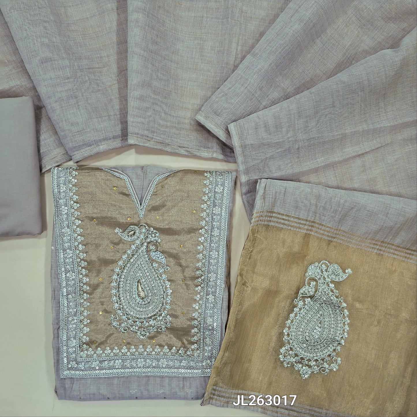 Designer pale pink silk cotton unstitched salwar material,zari buttas all over,gold tissue yoke with zarodzi, sequins and cutbead(lining needed)matching cotton bottom,silk cotton dupatta with gold tissue with zari work pallu. JL260317