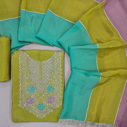 Mehandhi yellow golden tint organza silk unstitched salwar material,zari, sequins & thread work on yoke and daman,(soft,lining needed)matching silky bottom,organza silk dupatta.JL260507