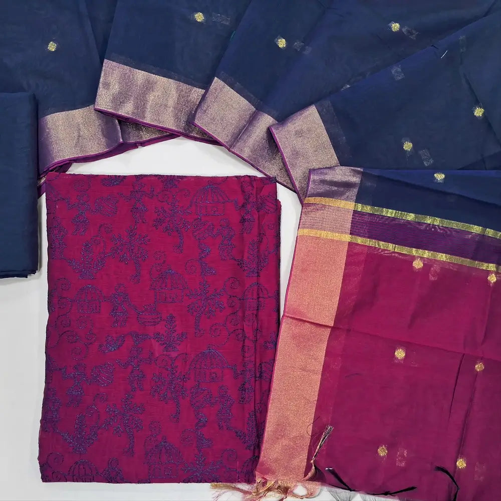 Rani pink & navy blue warli embroidery chanderi silk cotton unstitched salwar material,thread embroidery work on front (light weight,Lining Needed) silky bottom, dual shaded chanderi silk cotton dupatta with zari buttas and gold tissue borders. JL260505