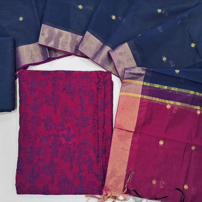 Rani pink & navy blue warli embroidery chanderi silk cotton unstitched salwar material,thread embroidery work on front (light weight,Lining Needed) silky bottom, dual shaded chanderi silk cotton dupatta with zari buttas and gold tissue borders. JL260505