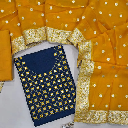 Dark blue fancy silk unstitched salwar material,(lining needed) faux mirror work on yoke,matching cotton bottom, zari and benarasi organza dupatta.JL260516