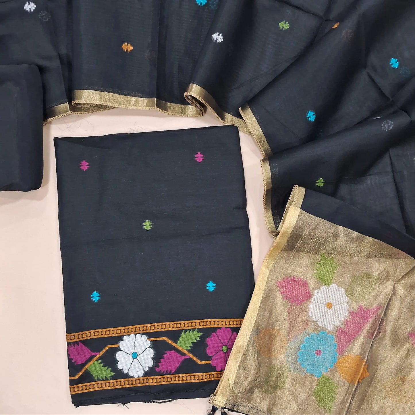 Designer black jamdani woven soft silk cotton unstitched salwar material (lining needed) bird floral weaving work on yoke,thread woven buttas on front, matching santoon bottom, jamdani woven silk cotton dupatta with gold tissue pallu. JL260706