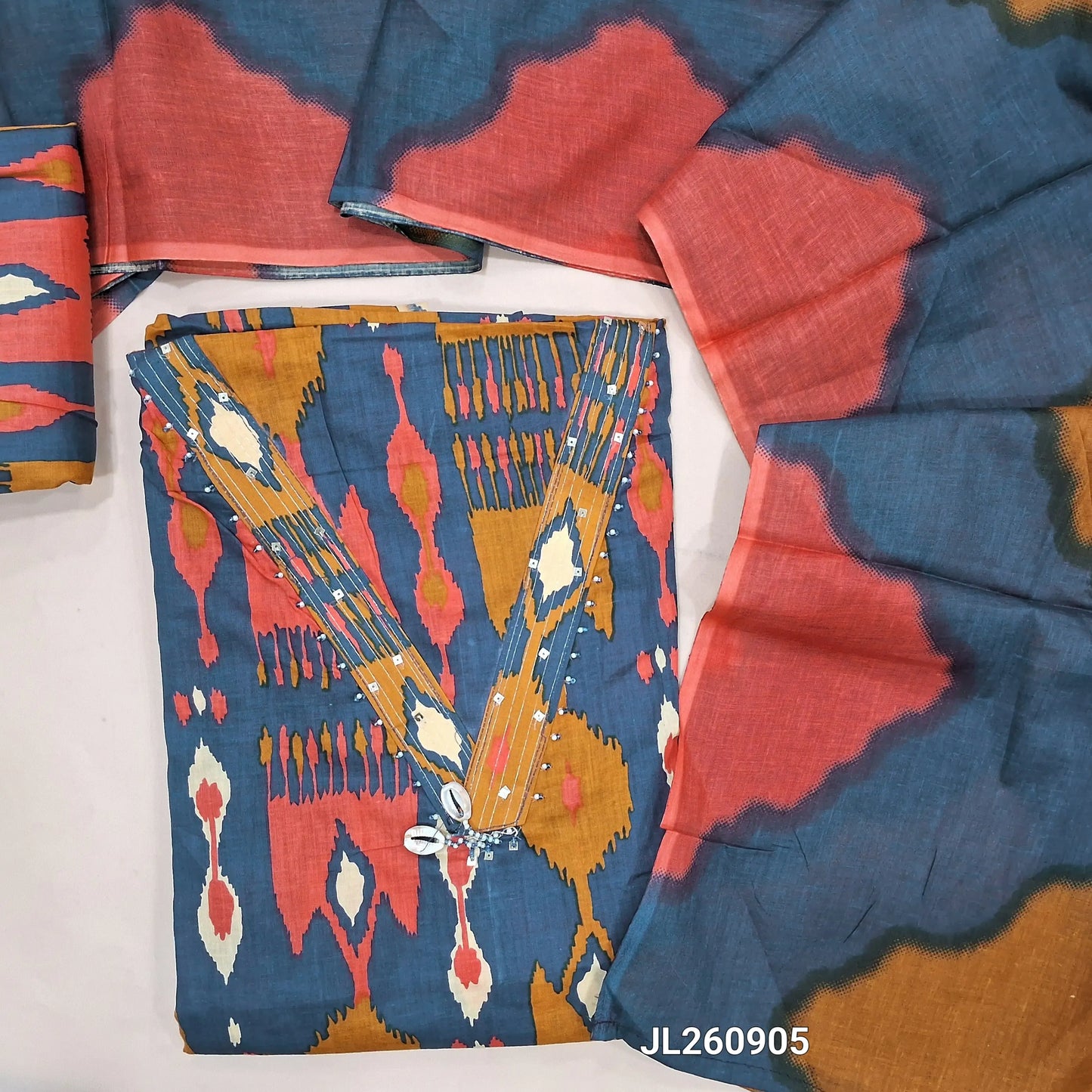 Dark blue pure cotton unstitched salwar material,zari linen & fancy shell buttons work on yoke, abstract printed all over (lining optional) printed cotton bottom, multicolor pure mul cotton dupatta.JL260905