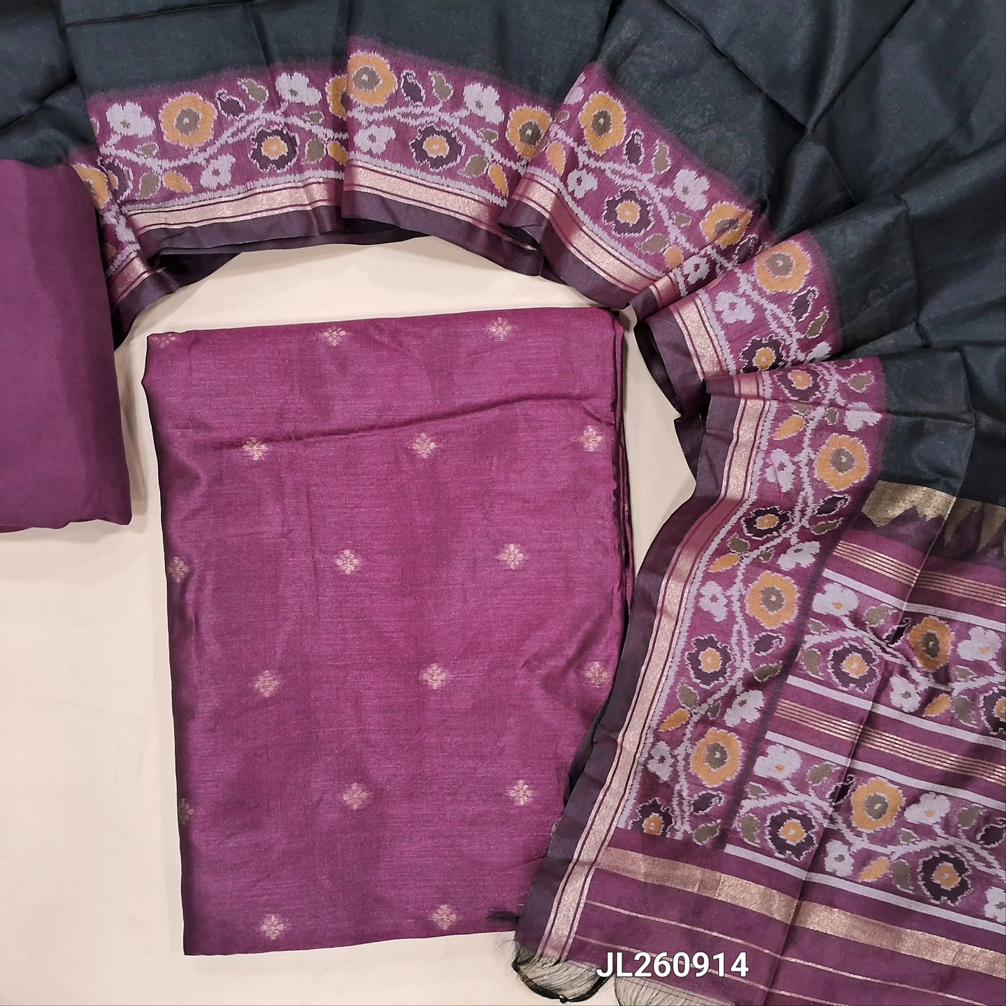 Beetroot purple premium silk unstitched salwar material (light weight,lining needed)zari buttas front,gold tissue border on daman,matching santoon bottom,dual shade thread weaving on silk dupatta with rich pallu & tassles.JL260914