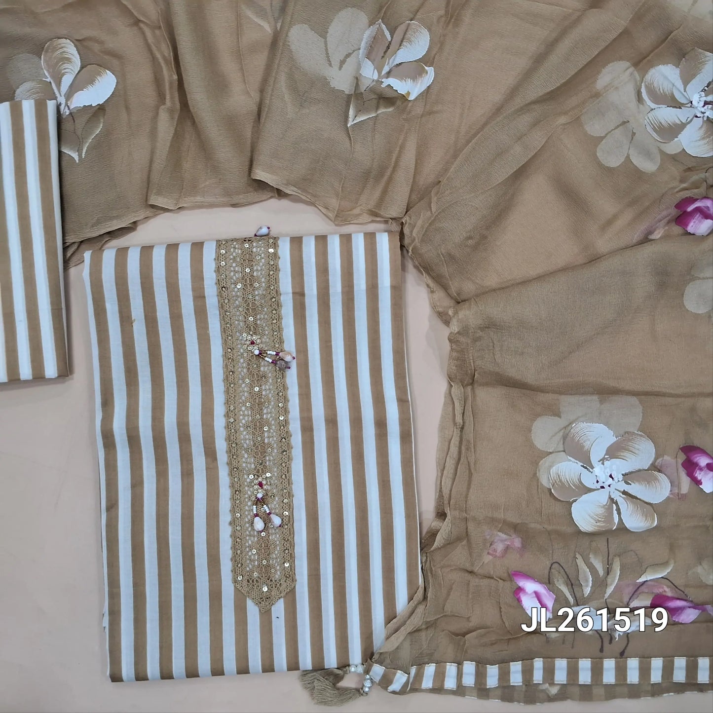 Off white base mul cotton unstitched salwar material, lace work and fancy buttons on yoke,striped all over(lining optional)striped cotton bottom,brush paint on chiffon dupatta. JL261519