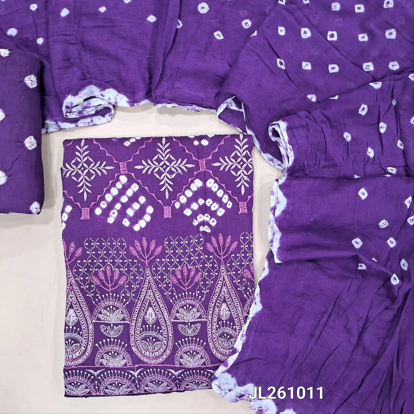 Violet bandhini dyed pure cotton unstitched salwar material (lining optional)embroidery & dye and dyed work on front,dye and dyed cotton bottom,bandhini dye & dyed mul cotton dupatta. JL261011