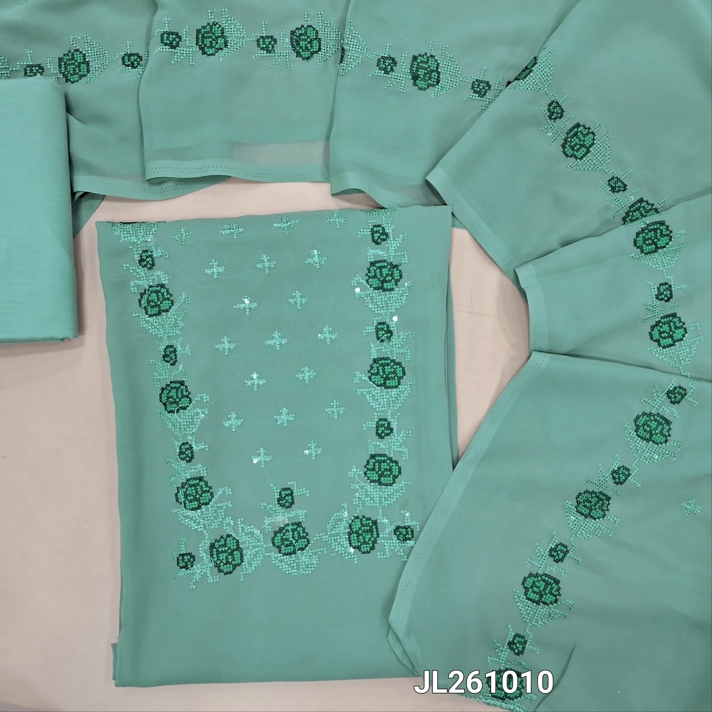 Pastel blue semi georgette unstitched salwar material,(lining needed)cross stitch embroidery work on yoke, matching silky bottom,cross stitch embroidery & sequins work on dupatta. JL261010