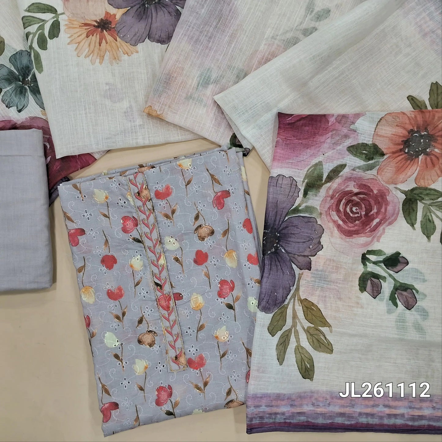 Light grey schiffli embroidered pure cotton unstitched salwar material,floral printed all over,(lining needed)fabric provided for lining, NO BOTTOM,floral printed semi linen dupatta.JL261112