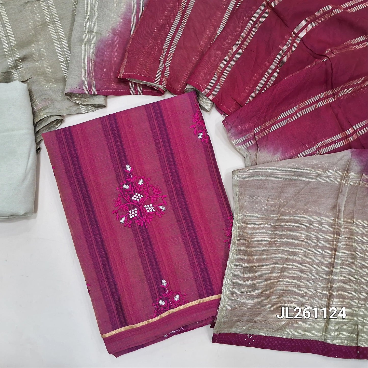 Dark pink fancy silk cotton unstitched salwar material, embroidery on front (Textured, Lining Needed) Beige santoon bottom, Dual shaded fancy silk cotton dupatta with zari lines. JL261124