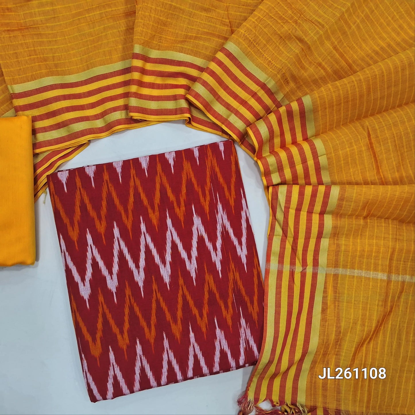 Reddish maroon ikat woven handloom cotton unstitched salwar material (lining needed)mango yellow silk cotton bottom, silk cotton dupatta with traditional border. JL261108