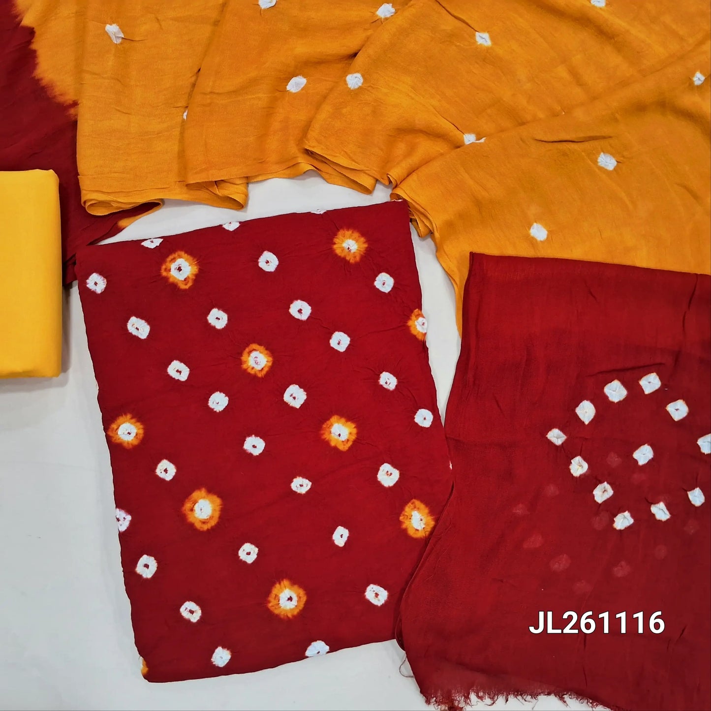 Reddish Maroon soft rayon unstitched salwar material, bandhini dyed all over (Lining Needed, Soft) Contrast Mango Yellow Cotton Bottom, Bandhini dyed rayon dupatta. JL261116