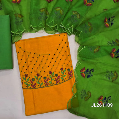 Mango yellow slub silk cotton unstitched salwar material, hand embroidery work on yoke, (lining needed) gren cotton bottom, embroidery work on organza duppata with scallop edges. JL261109