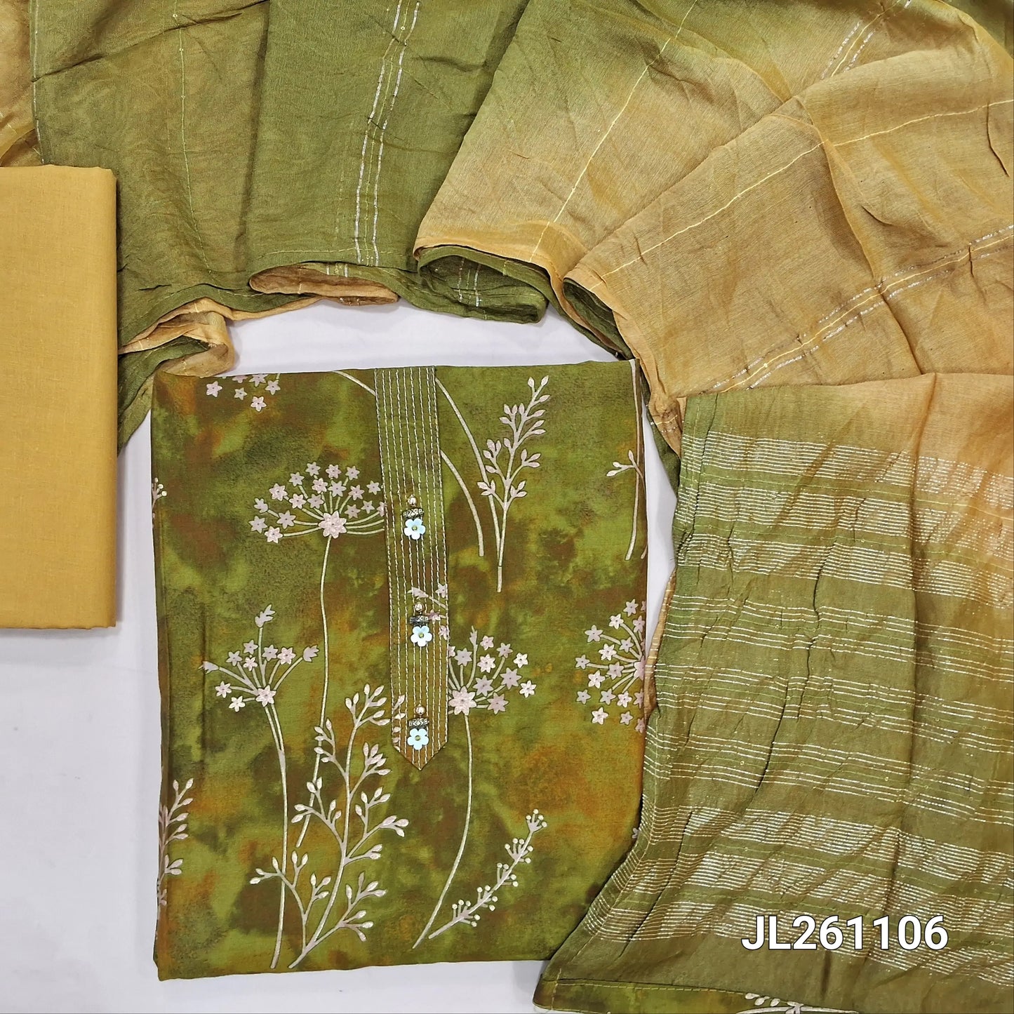 Mehandhi green digital printed silk cotton unstitched salwar material, simple yoke (lining optional)mehandhi yellow cotton bottom,dual shaded fancy silk cotton dupatta with zari lines and sequins work. JL261106