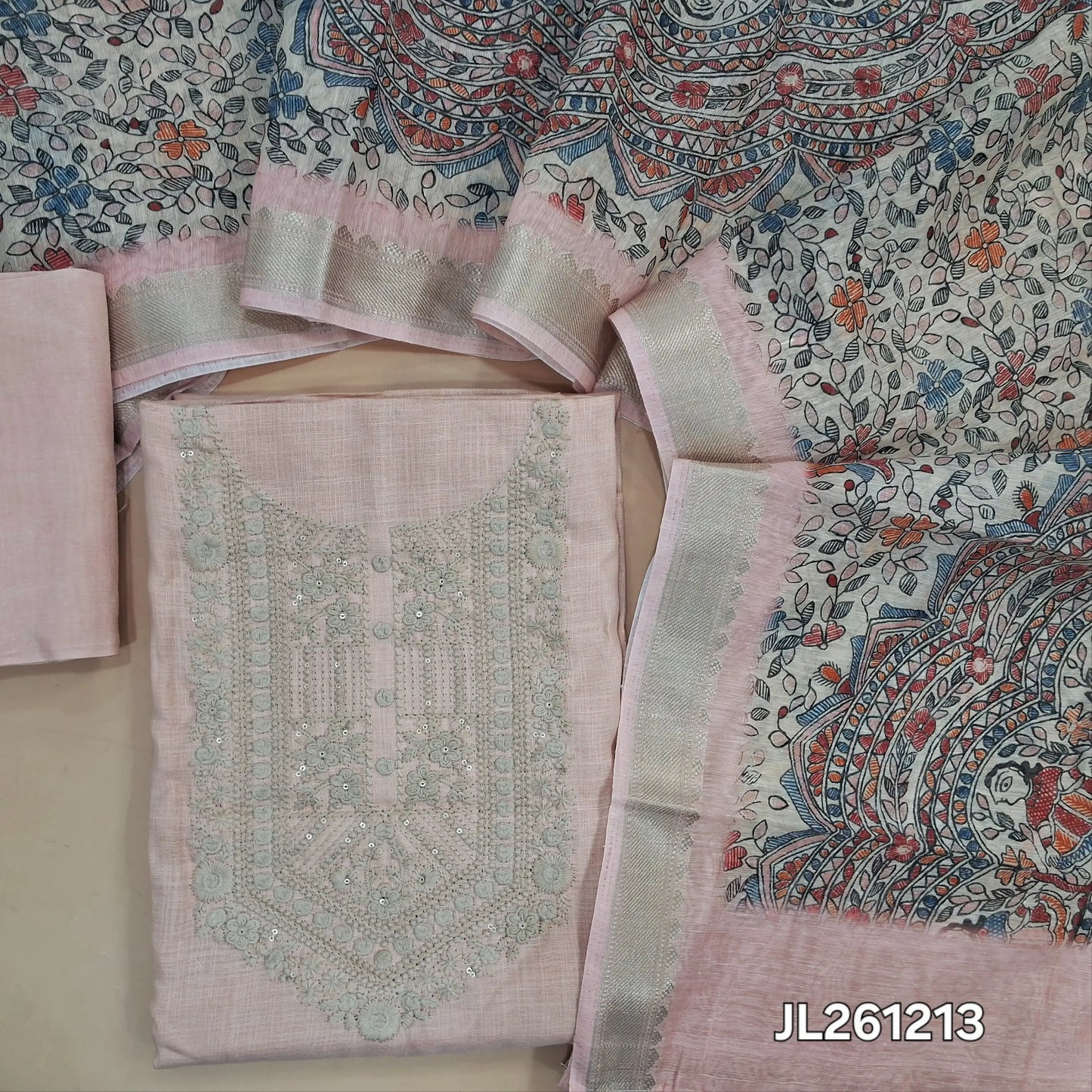 Pastel pink semi linen unstitched salwar material, embroidery work on yoke, (lining needed)santoon bottom,madhubani printed semi linen dupatta with gold borders. JL261213