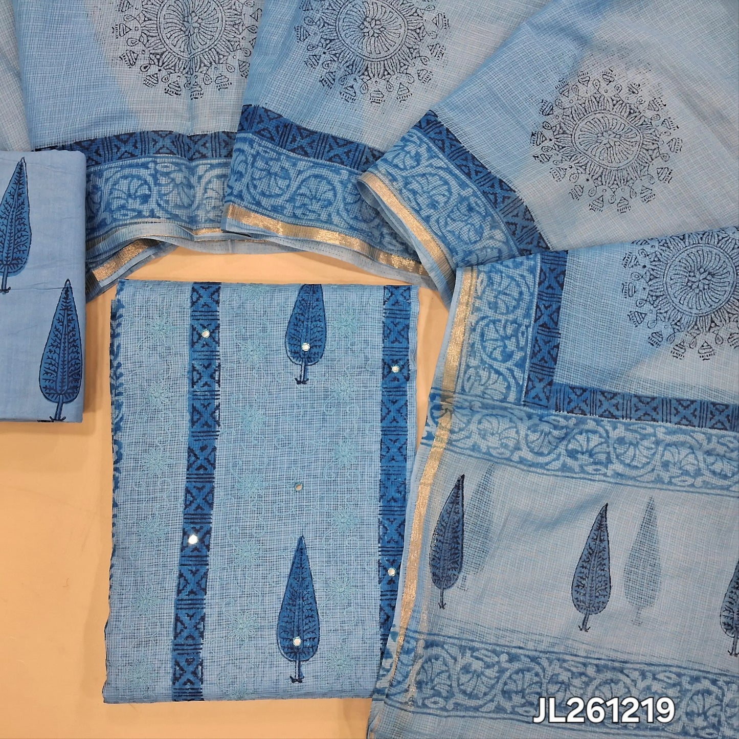 Pastel blue premium hand block printed kota unstitched salwar material,faux mirror and self embroidery work on front,( thin,Lining Needed) block printed drum dyed cotton bottom,block printed kota dupatta with tissue borders. JL261219