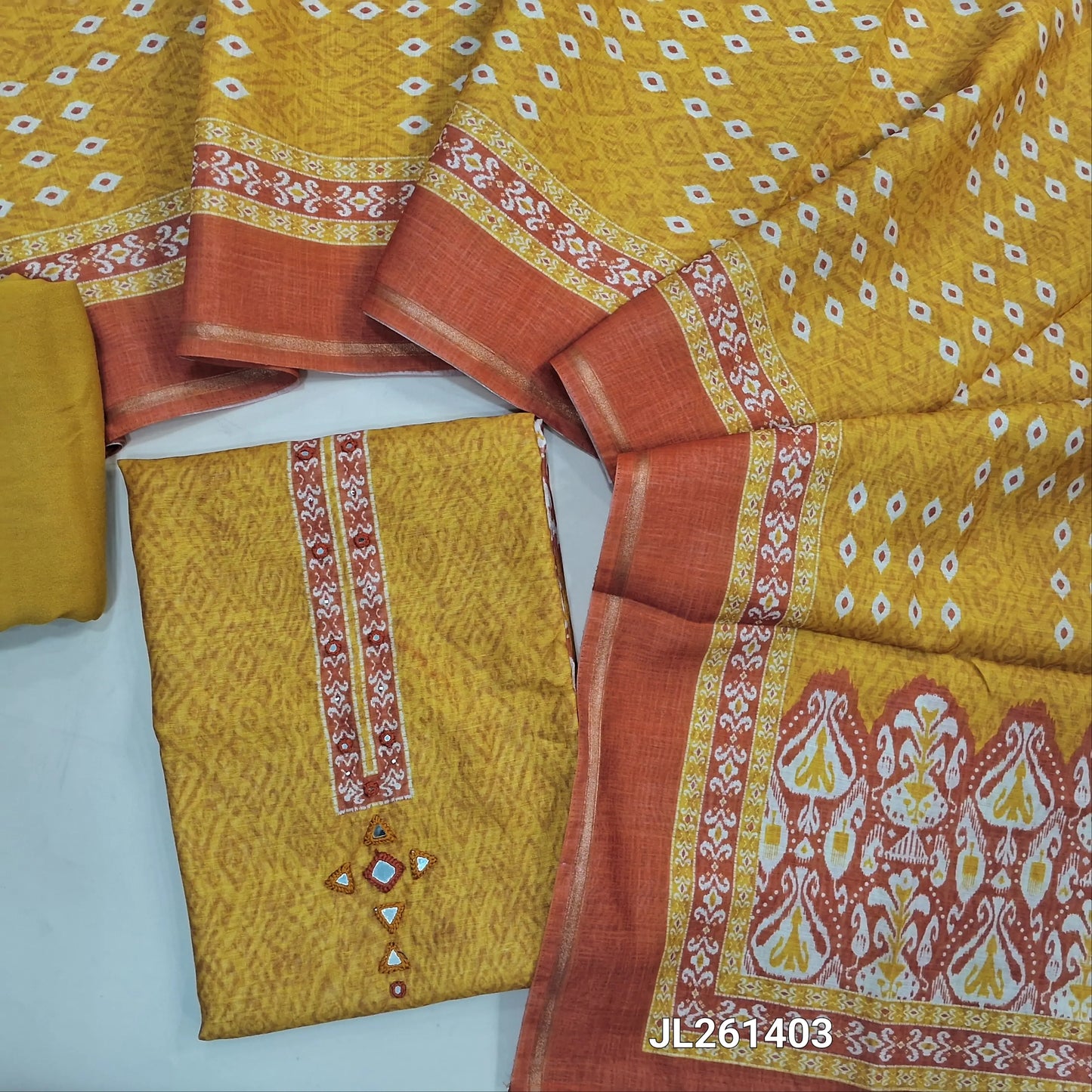Mehandhi yellow & peachish pink digital printed chanderi silk cotton unstitched salwar material,printed yoke with mirror work(Lining Needed)spun cotton bottom, digital printed chanderi silk cotton dupatta with tissue borders and lace tapping. JL261403
