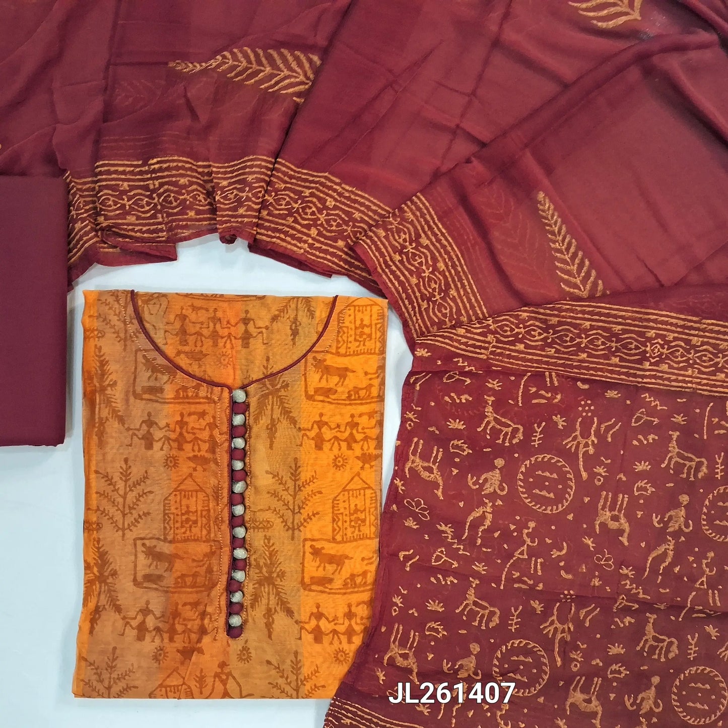 Peach & yellow warli printed fancy silk cotton unstitched salwar material, potli buttons on yoke,(lining needed)maroon cotton bottom,block printed chiffon dupatta. JL261407
