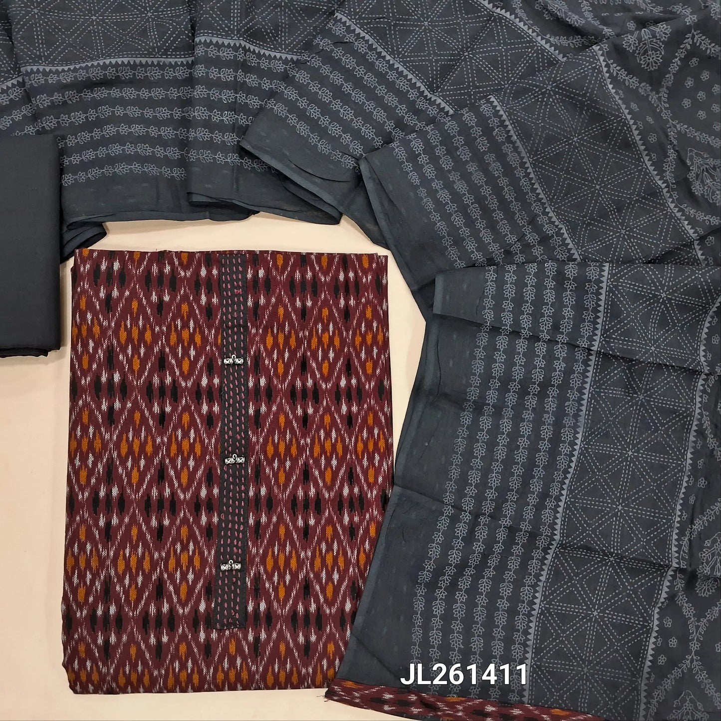 Dark maroon ikat printed pure cotton unstitched salwar material,fancy buttons on yoke,(lining optional)black cotton bottom, block printed and self design on pure mul cotton dupatta. JL261411
