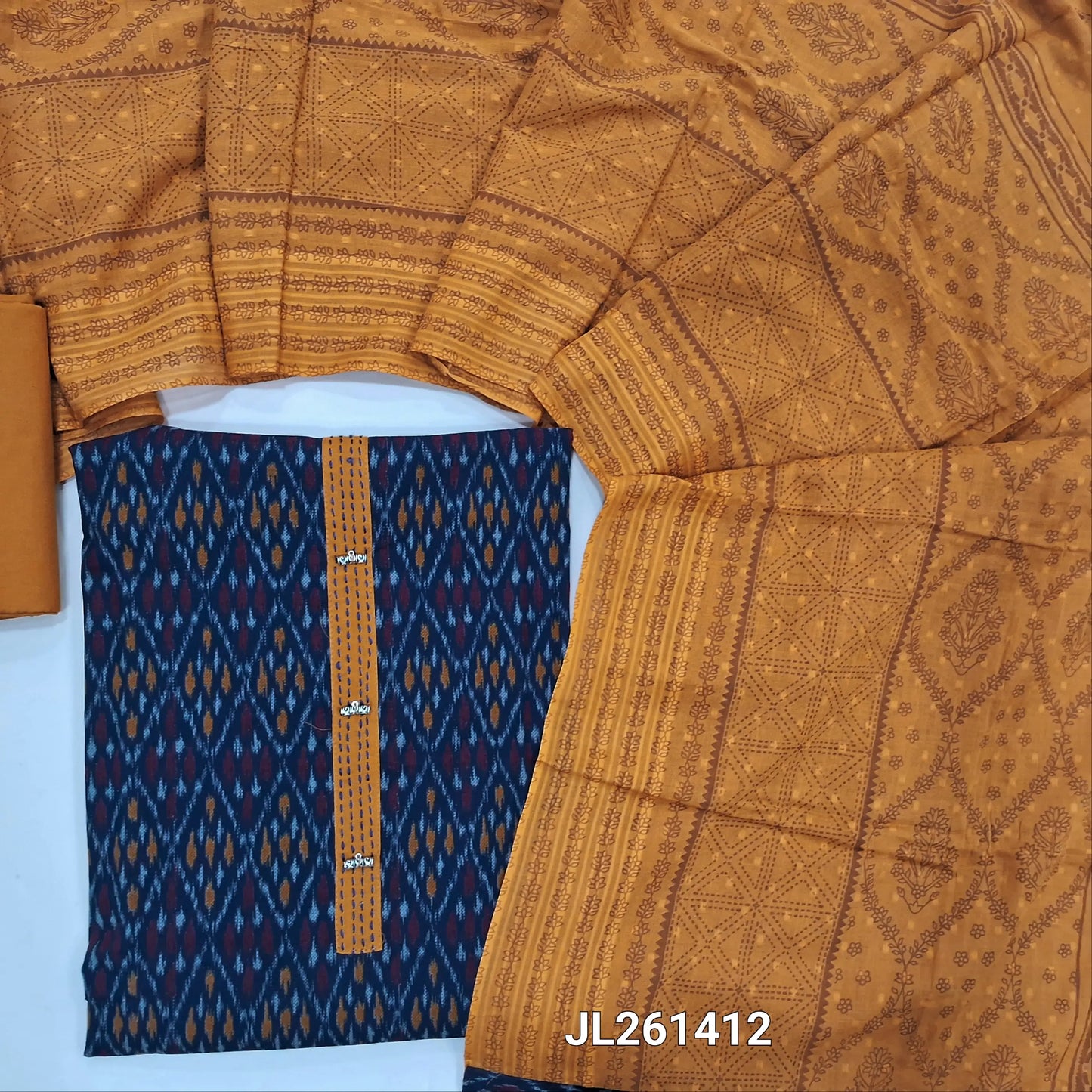 Dark blue ikat printed pure cotton unstitched salwar material,fancy buttons on yoke,(lining optional)mehandhi yellow cotton bottom, block printed and self design on pure mul cotton dupatta. JL261412
