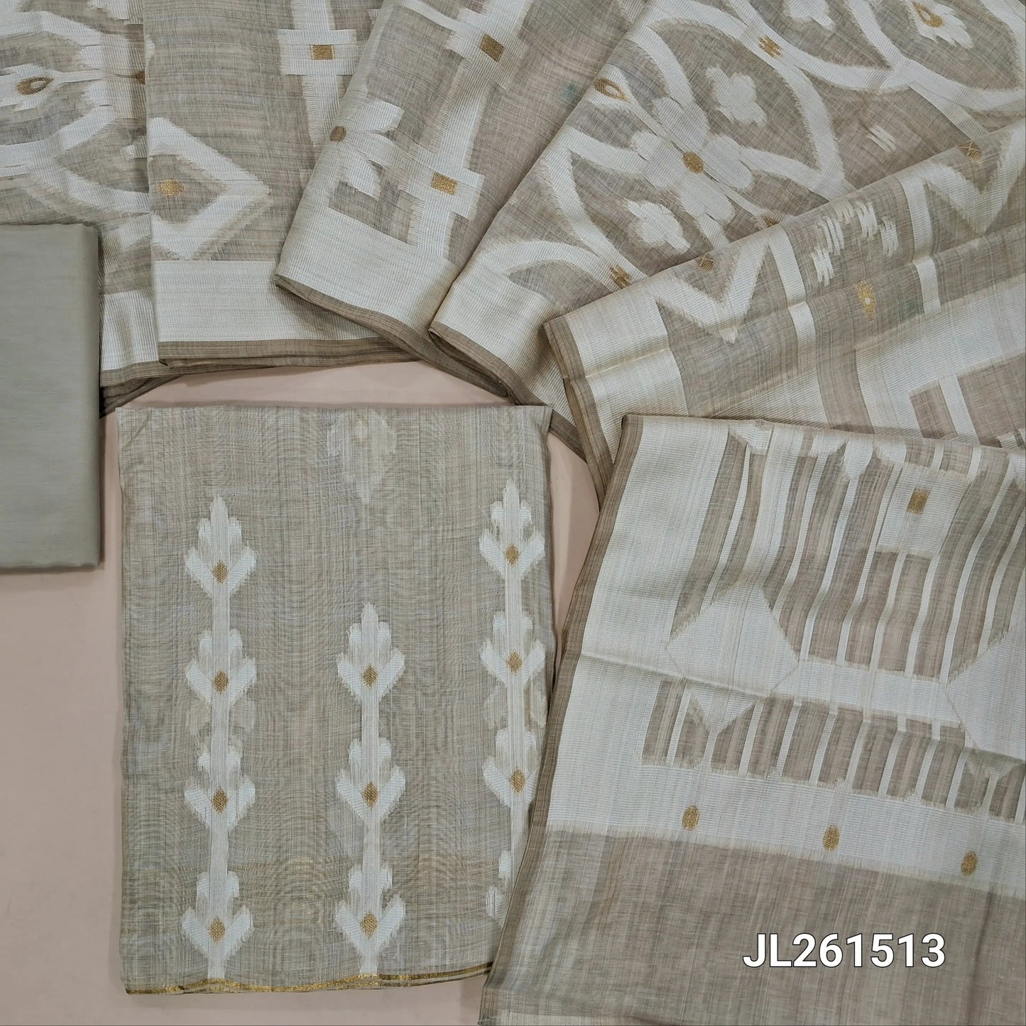 Rich beige soft silk cotton unstitched salwar material, gold zari and thread weaving all over,(lining needed)silky bottom, thread weaving full length soft silk cotton dupatta. JL261513