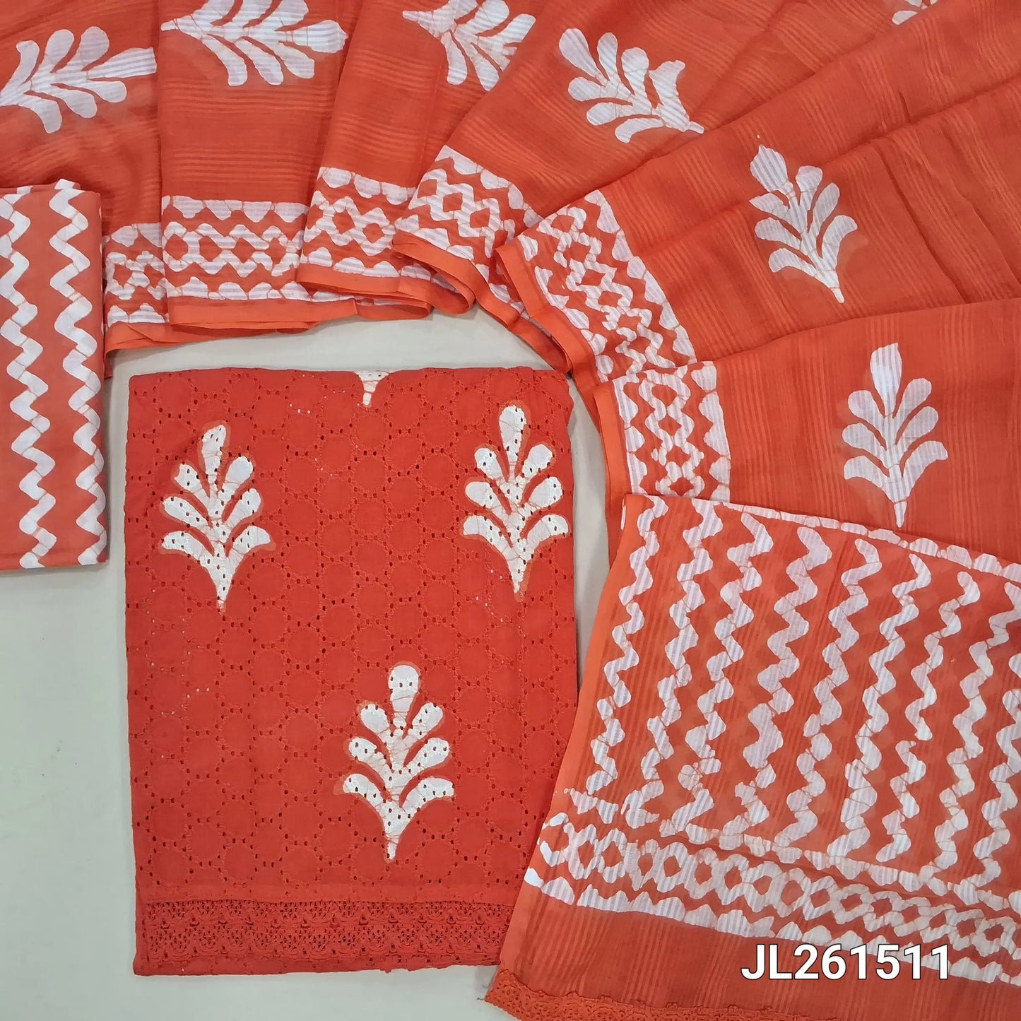 Bright orange schiffli embroidered batik cotton unstitched salwar material(lining needed)cut work & self embroidery work on front, zig zag cotton bottom,batik pure mul cotton dupatta. JL261511