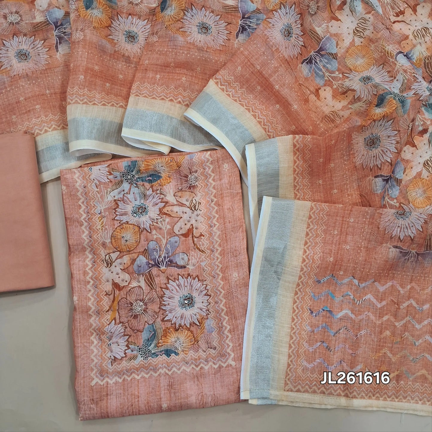 Peachish pink semi linen unstitched salwar material,floral, hand embroidery,sequins work on yoke,(lining needed)spun cotton bottom,digital printed semi linen dupatta with silver tissue borders. JL261616