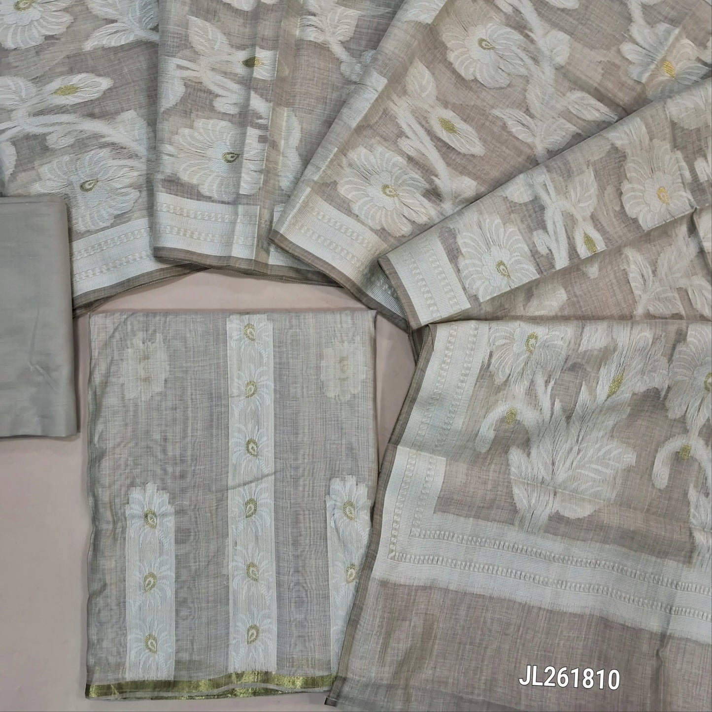 Rich beige soft silk cotton unstitched salwar material, gold zari and thread weaving on front,(lining needed)silky bottom, thread weaving full length soft silk cotton dupatta. JL261810
