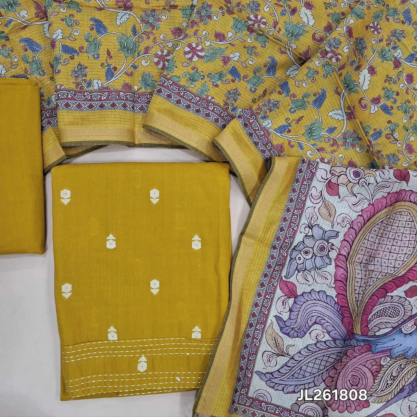 Mehandhi yellow premium handloom cotton unstitched salwar material,thread woven buttas all over, kantha stitch daman,(lining needed)cotton bottom, digital printed premium chanderi silk cotton dupatta with tissue borders. JL261808